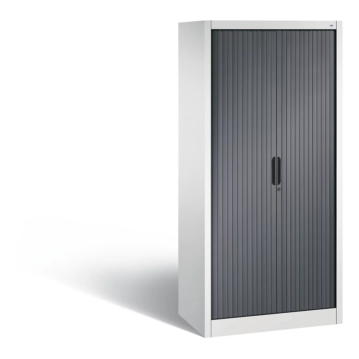 A white cabinet with a gray roller shutter door. Black handle and lock. Shadow on a light background.
