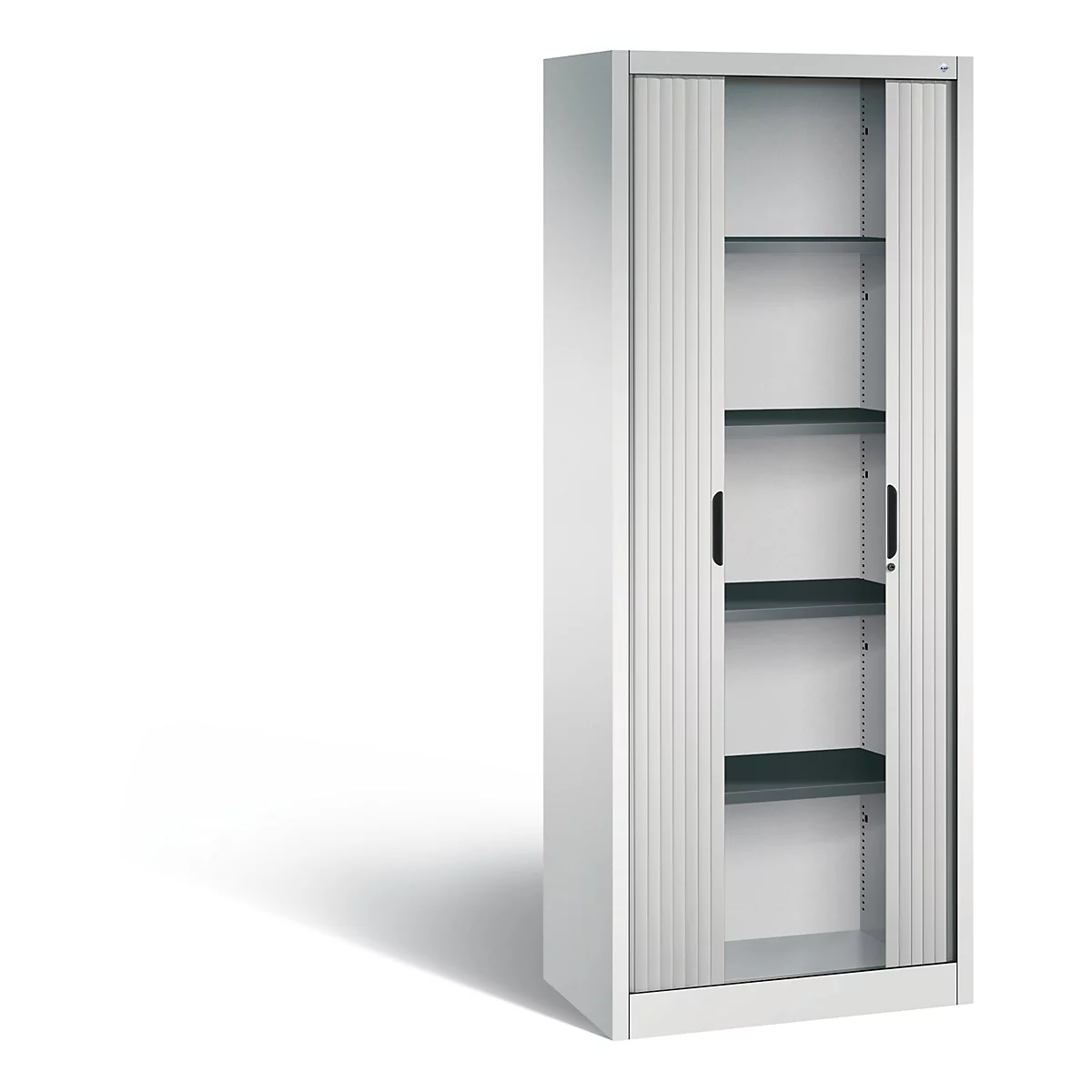 White cabinet with roller shutters and black handles. Interior shelves. Shadow.