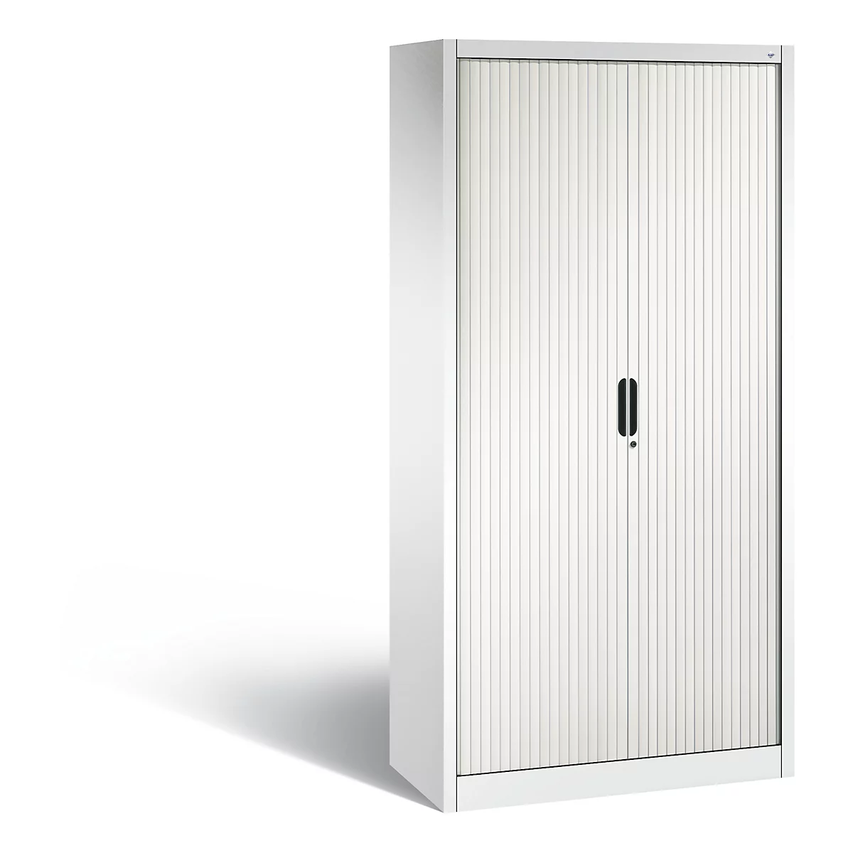 White filing cabinet with a ridged front, black handle, and keyhole. A shadow is visible to the left of the image.