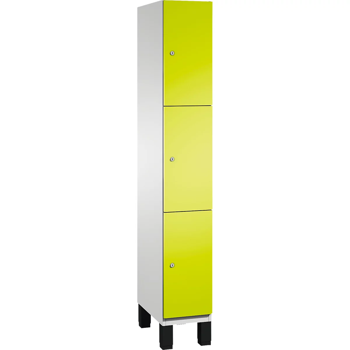 Schrank mit drei Türen, weiß und gelb, auf schwarzen Füßen.