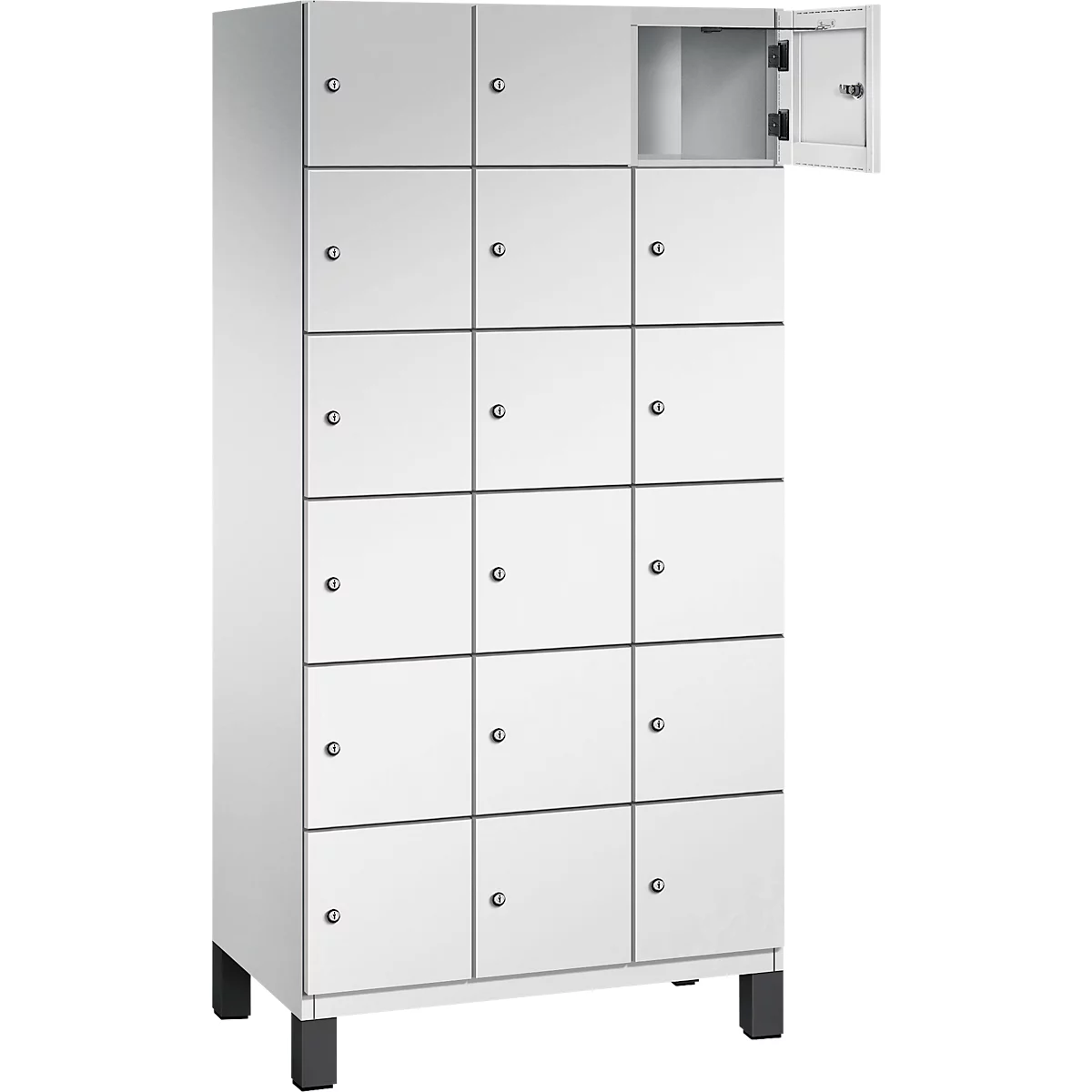 Weißer Schrank mit 16 Fächern, ein Fach geöffnet. Schwarze Füße.