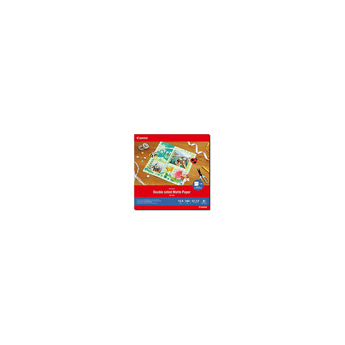 Verpackung von Canon beidseitig mattem Fotopapier mit Bastelprojekt auf Holzoberfläche.