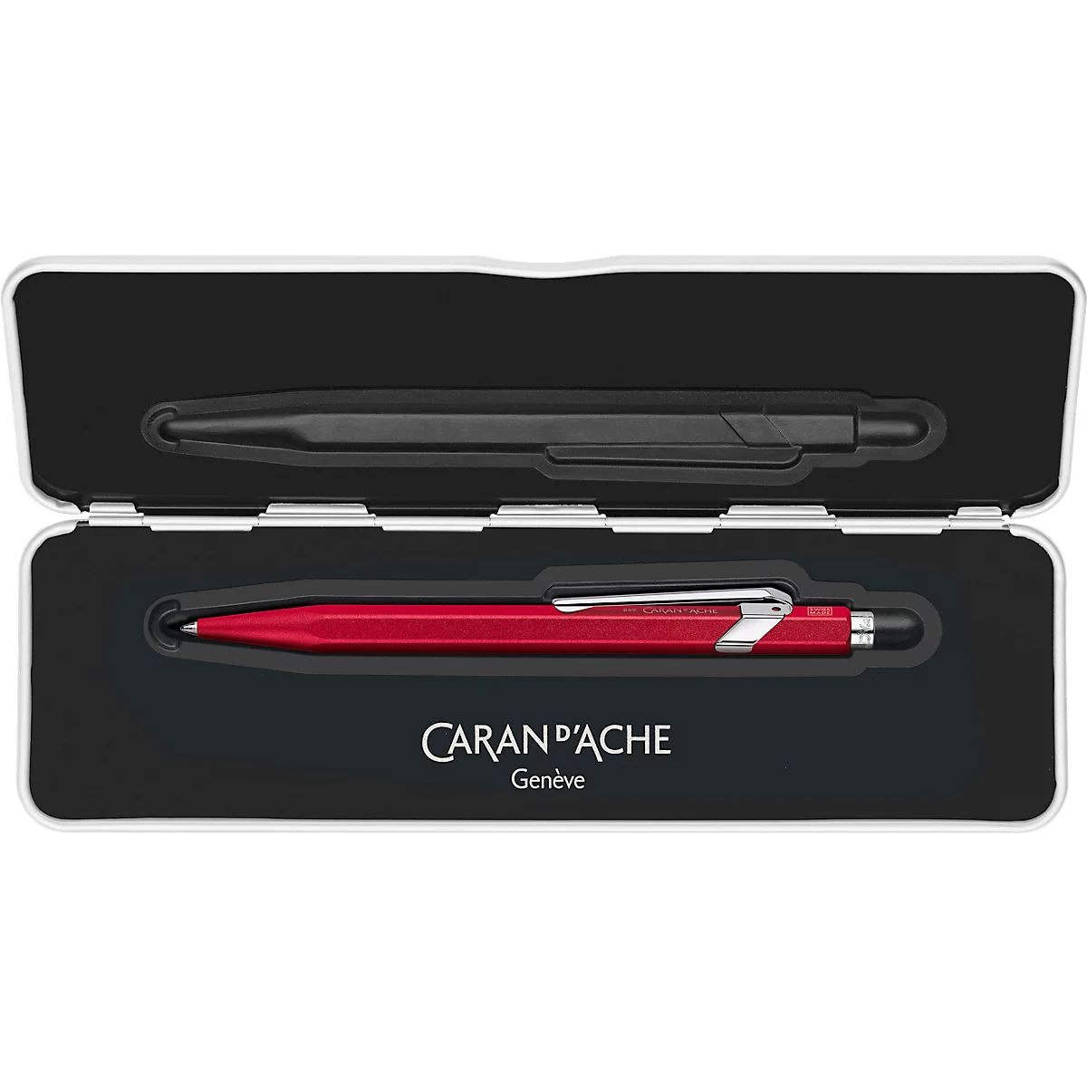 Opened pen box with two ballpoint pens. A black pen at the top, a red pen at the bottom. Inscription: Caran d'Ache Genève.