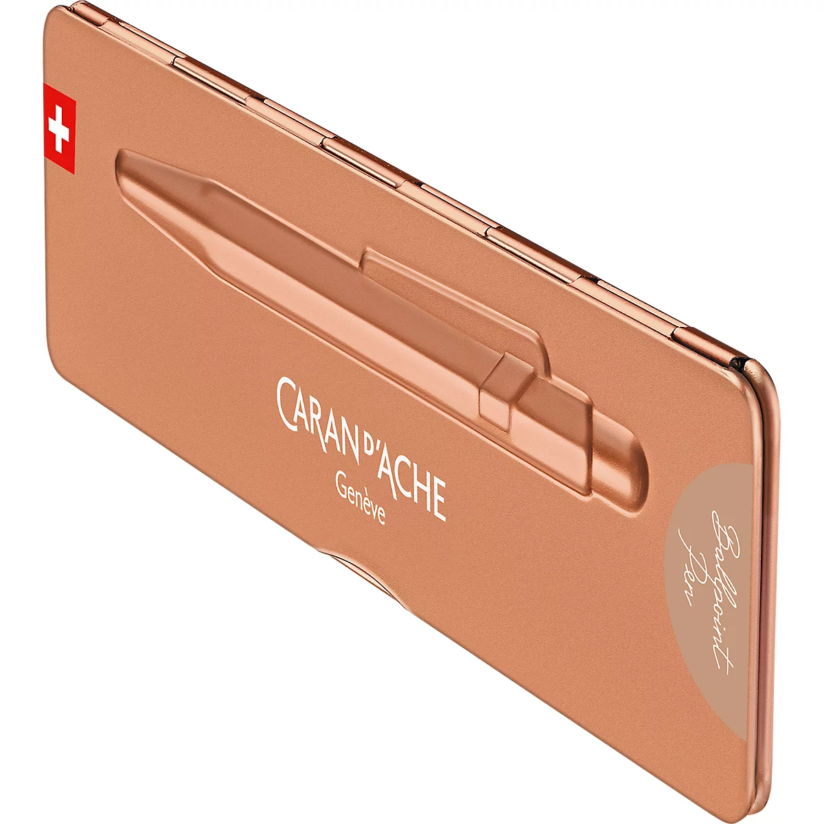 Eine kupferfarbene Stiftverpackung mit einem Schweizer Kreuz, dem Schriftzug CARAN D'ACHE Genf und dem Hinweis „Ballpoint Pen”.