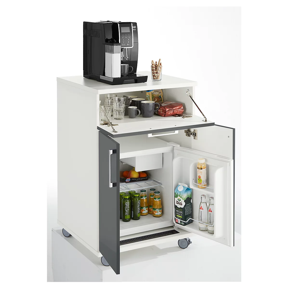 Espresso machine on a white cabinet with drinks and snacks in the compartments. Refrigerator open.