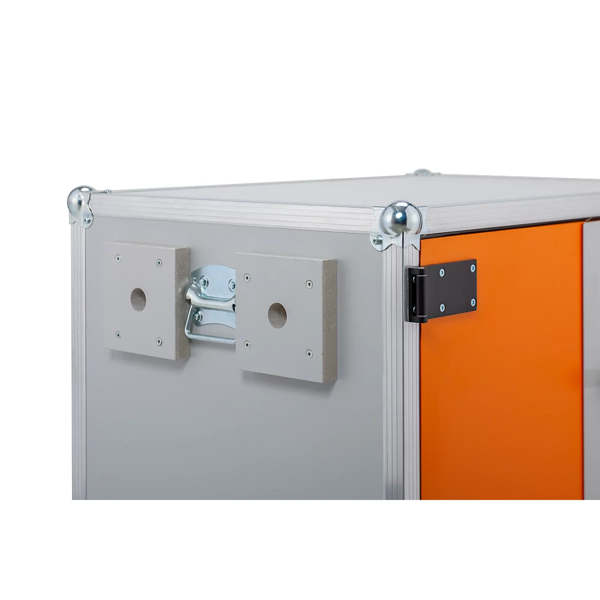 Detailed view of a flight case corner with fittings and an orange door.