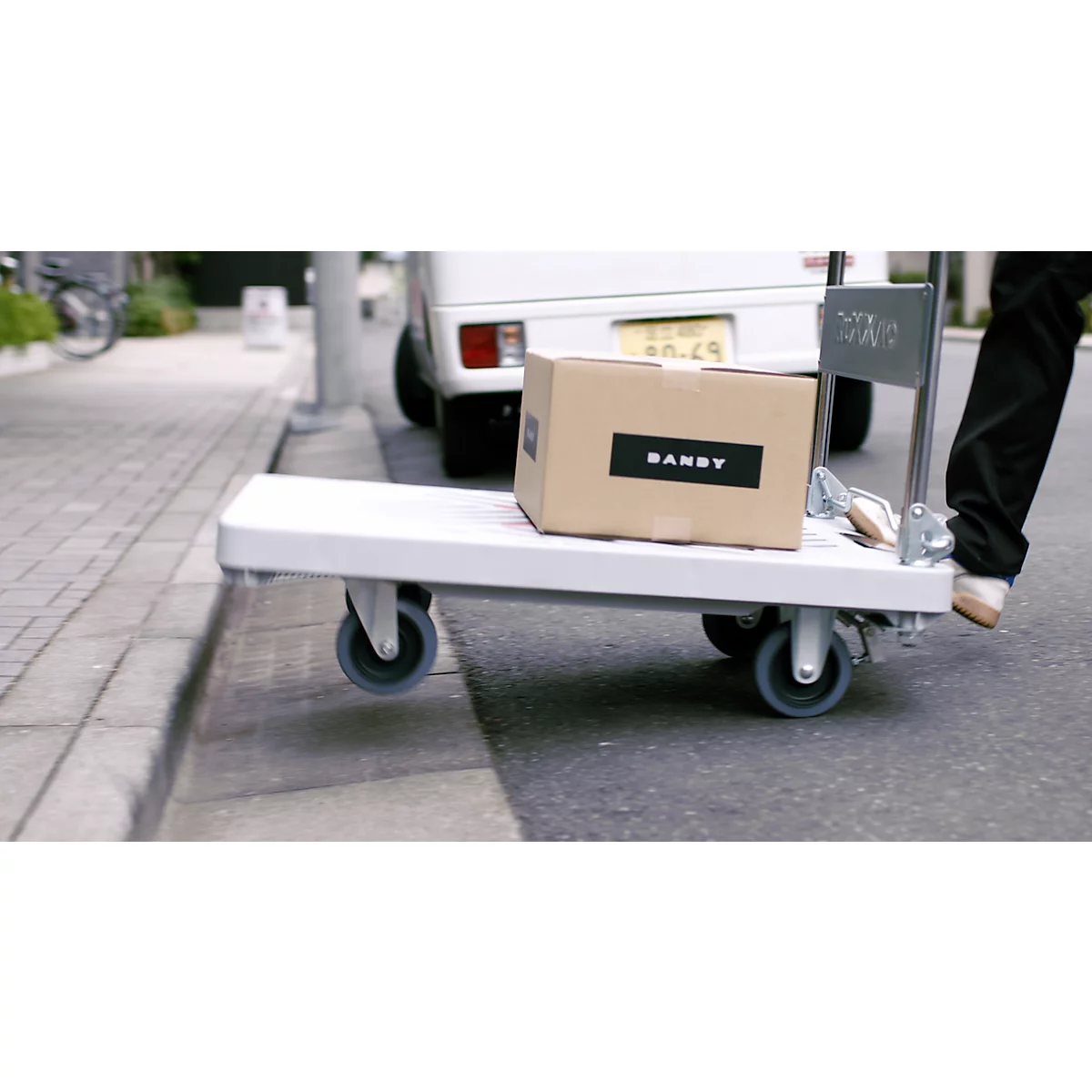 Chariot plate-forme RuXXac Dandy, jusqu'à 180 kg, 2 roues pivotantes et 2 fixes, avec caoutchouc Spannfix, avec freins, polypropylène