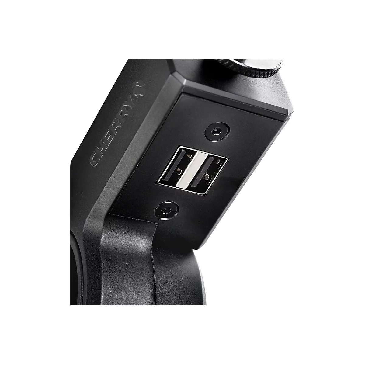Gros plan sur un composant d'appareil noir avec port USB et lettrage "CHERRY".