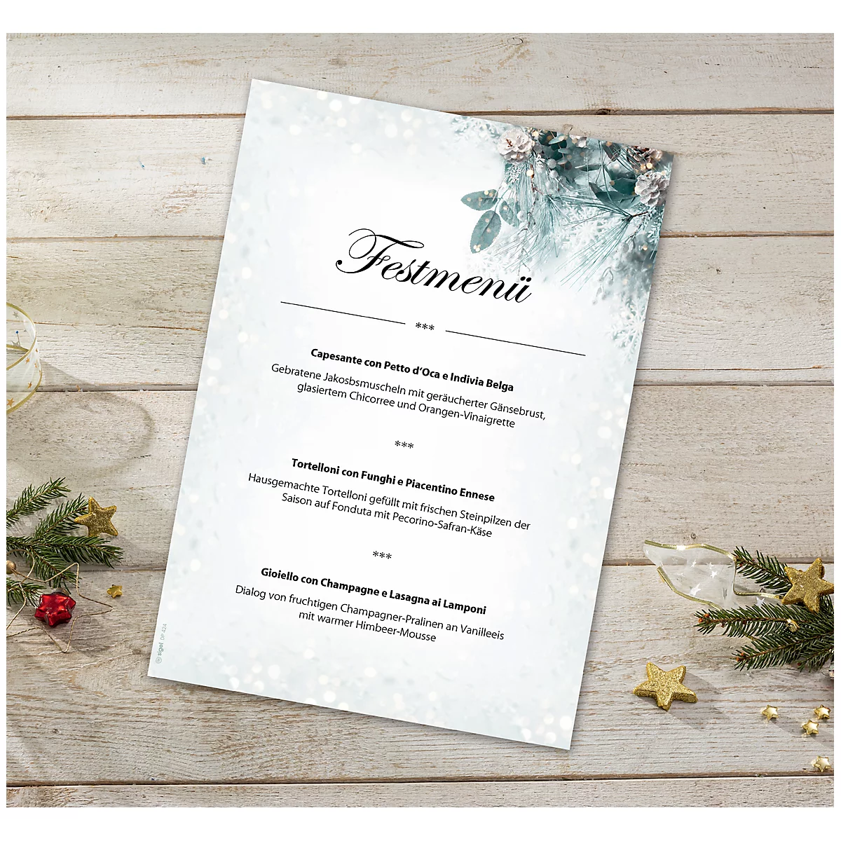 Menu card with Christmas design. Text: Festive menu. Decorated on a wooden table with fir branches and stars.
