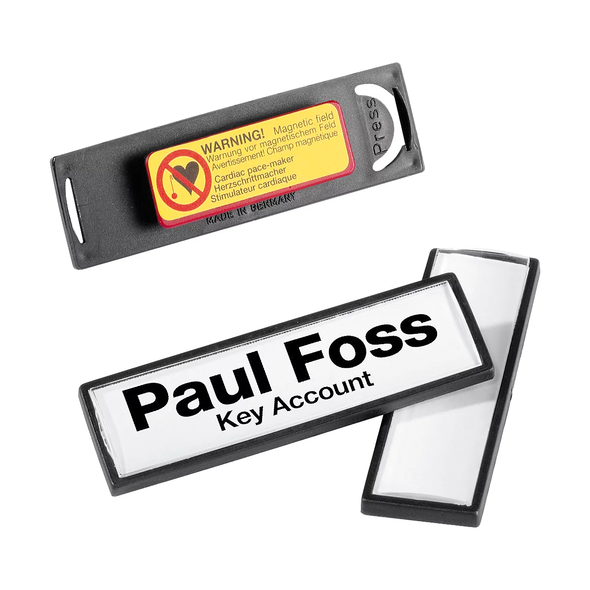 Name badges with a magnetic warning. One badge says 'Paul Foss, Key Account'.