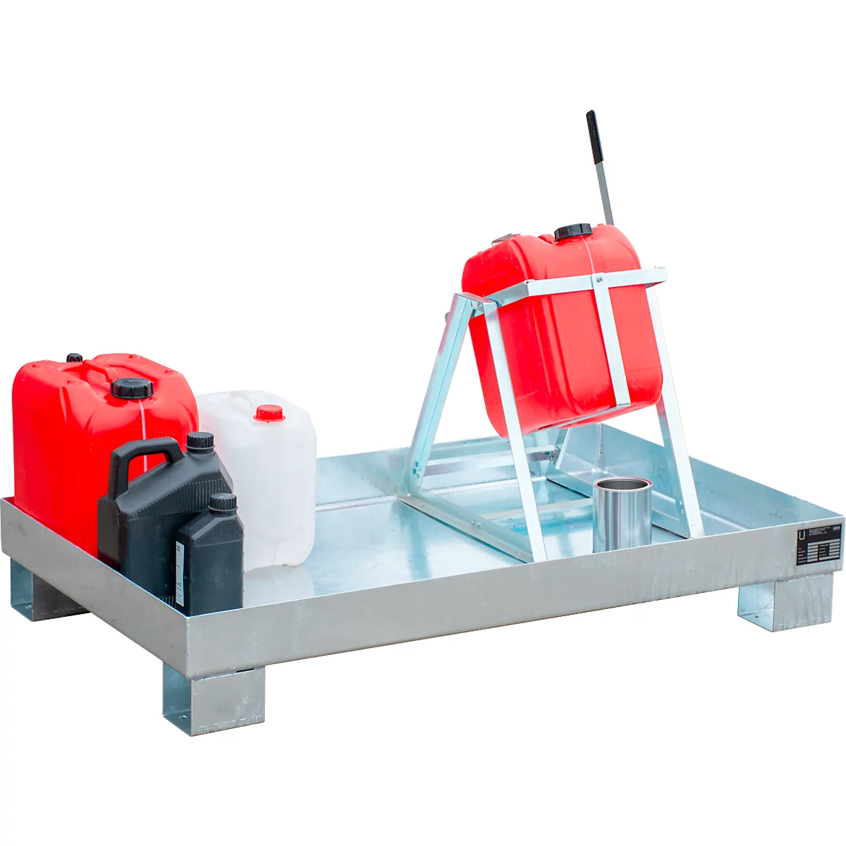Metal tray with canisters and turning aid. Red canister in turning aid, more canisters in red, white and black.