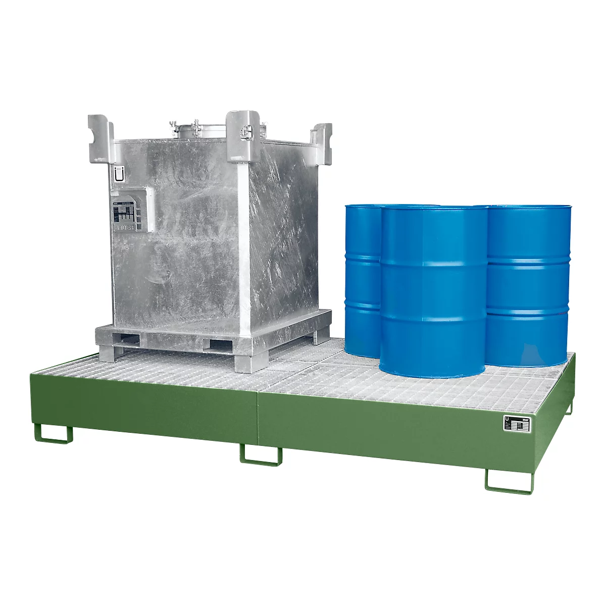 Large metal container and blue barrels on a green spill containment pallet.