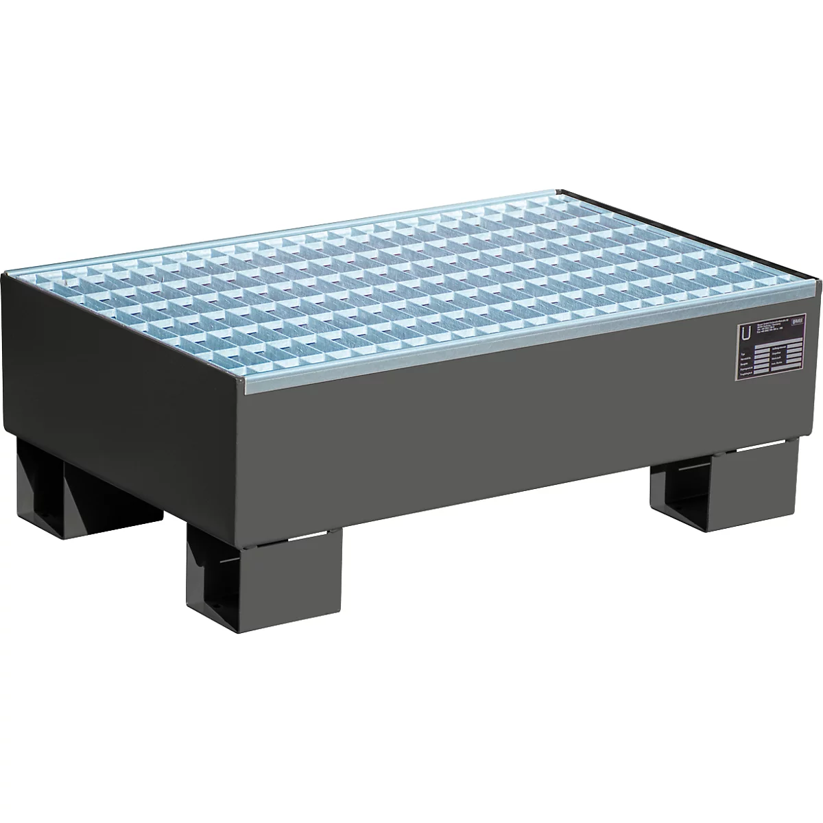 Gray container with grating, stands on four pedestals. The grating is blue. There is a label on the side.