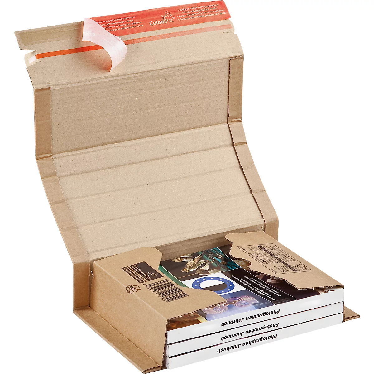 Open brown shipping box with books inside. The box is sealed with tape.