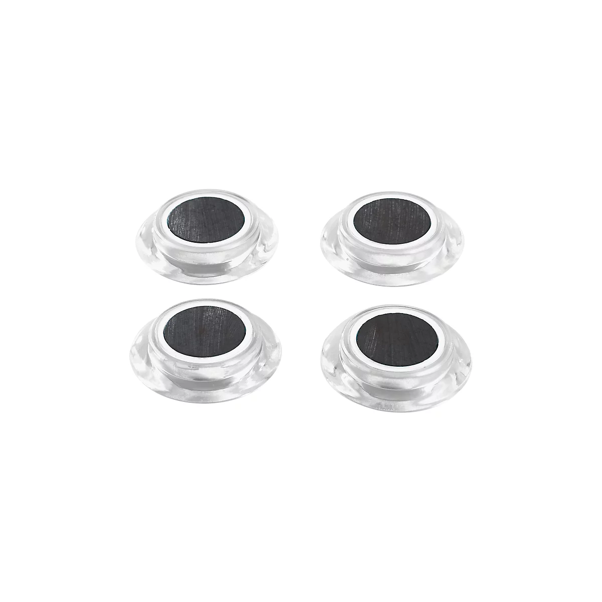 Four transparent furniture gliders with a black, round core and white edge.