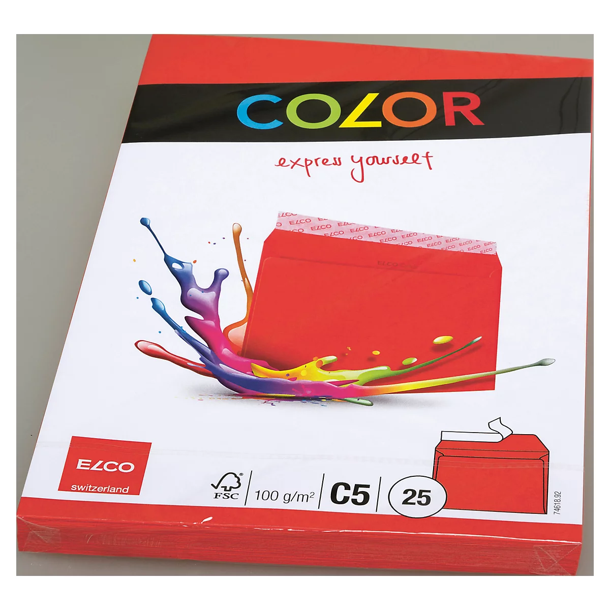 Red paper pack with the inscription COLOR, paint splashes, a red brochure and other text.