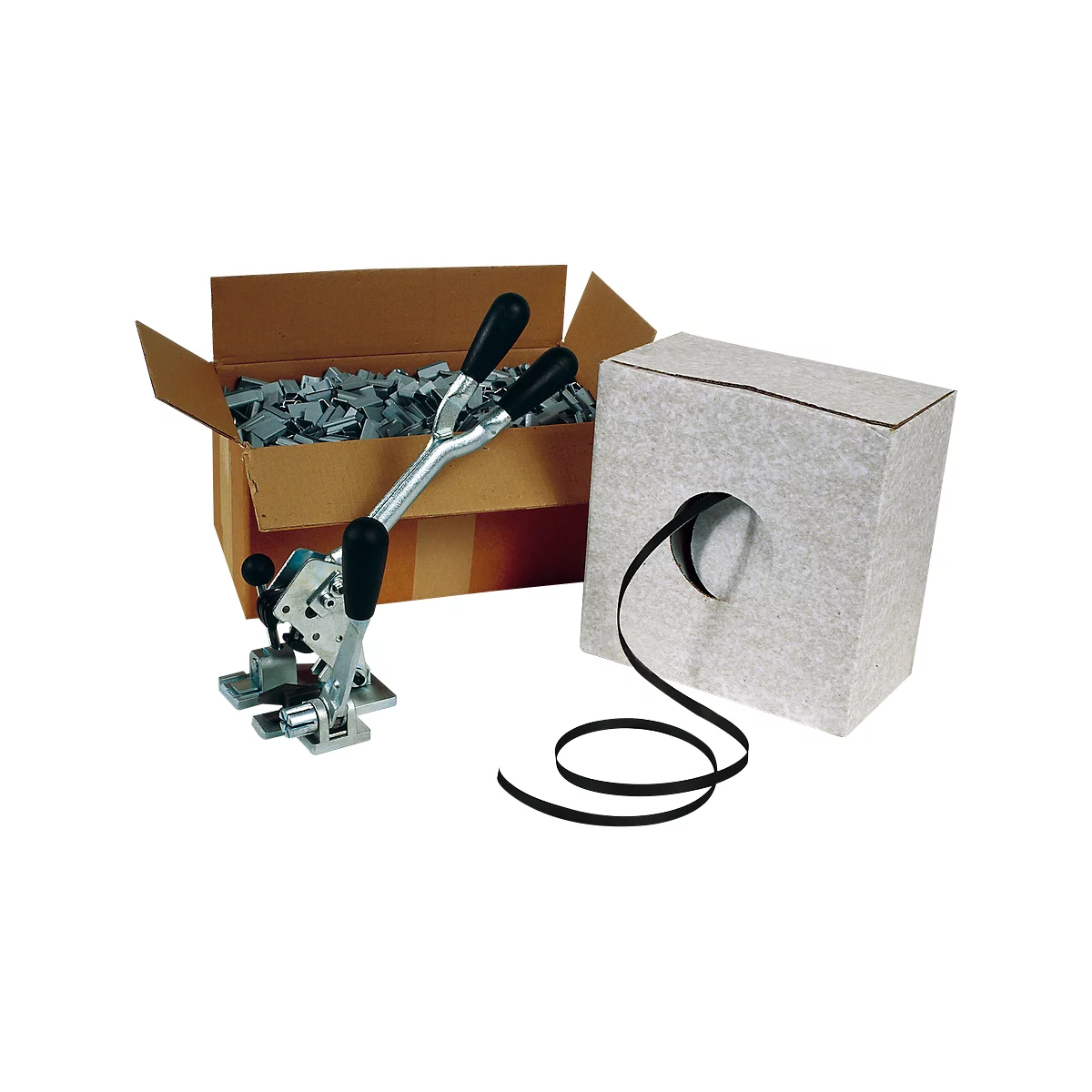 A machine and accessories for packaging. On the left, a tool, on the right a roll of tape.