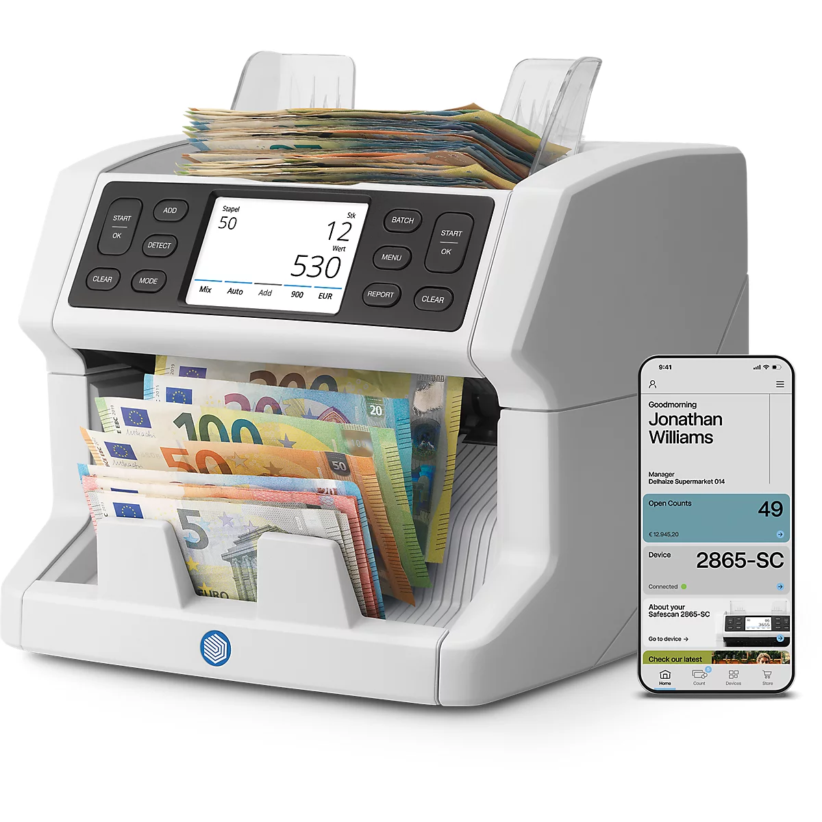 Machine de comptage de billets avec des billets en euros. Un petit écran affiche 530.