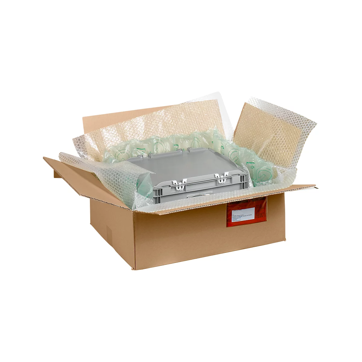 Grey suitcase packaged in an open cardboard box with bubble wrap.