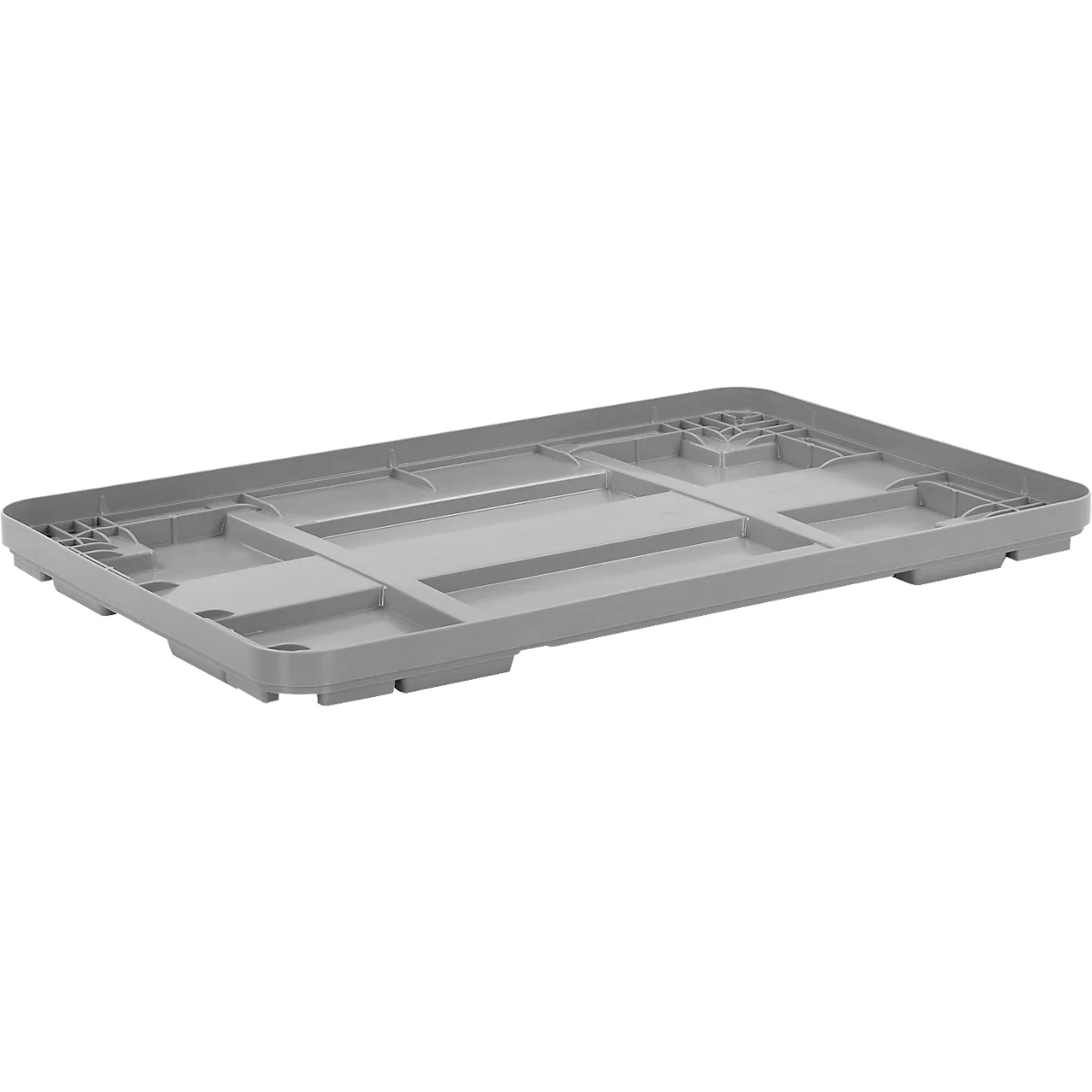 Caisse en plastique gris clair, prise de vue légèrement d'en haut. Forme rectangulaire, avec des nervures et des structures de support à l'intérieur.