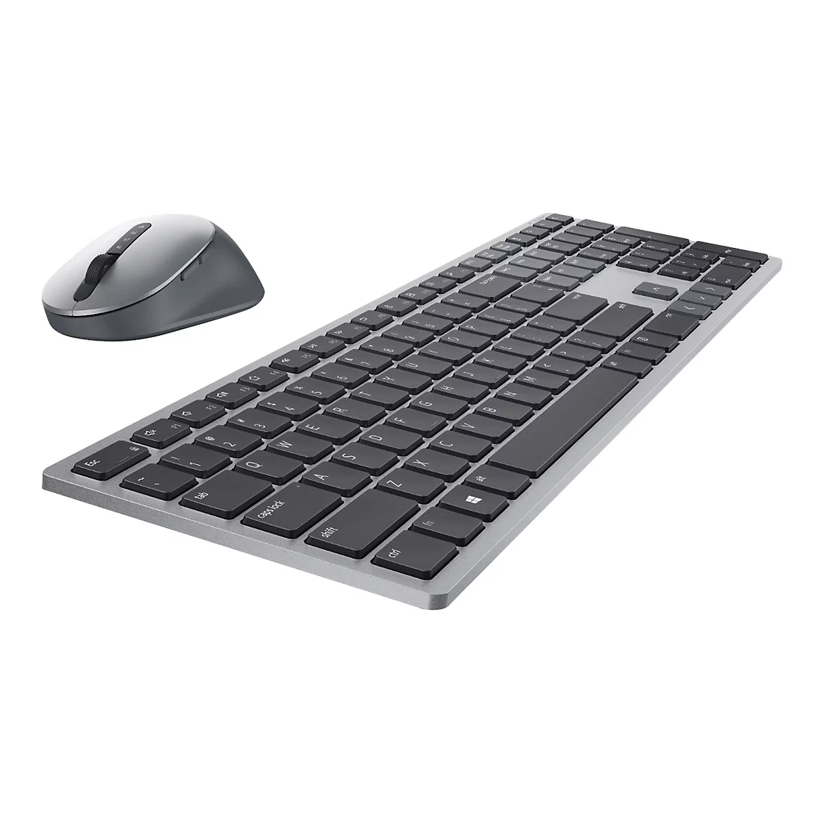 Vue de dessus d'un clavier gris et d'une souris sur fond blanc.