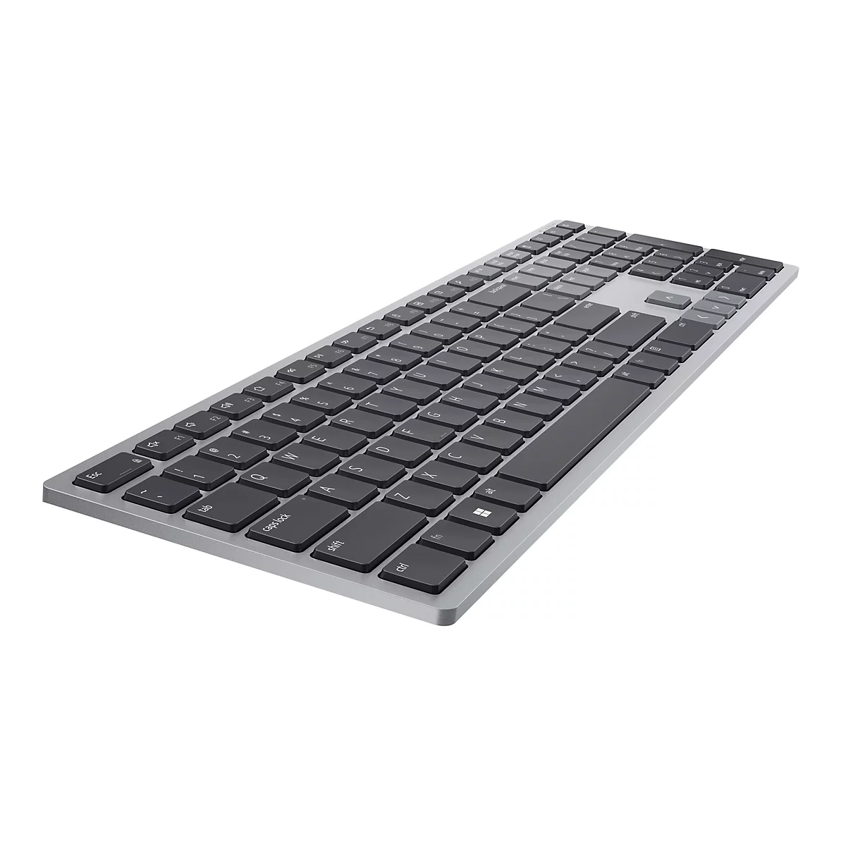 Vue de dessus d'un clavier d'ordinateur gris avec des touches noires. Le clavier a un design élégant et repose sur un fond blanc.