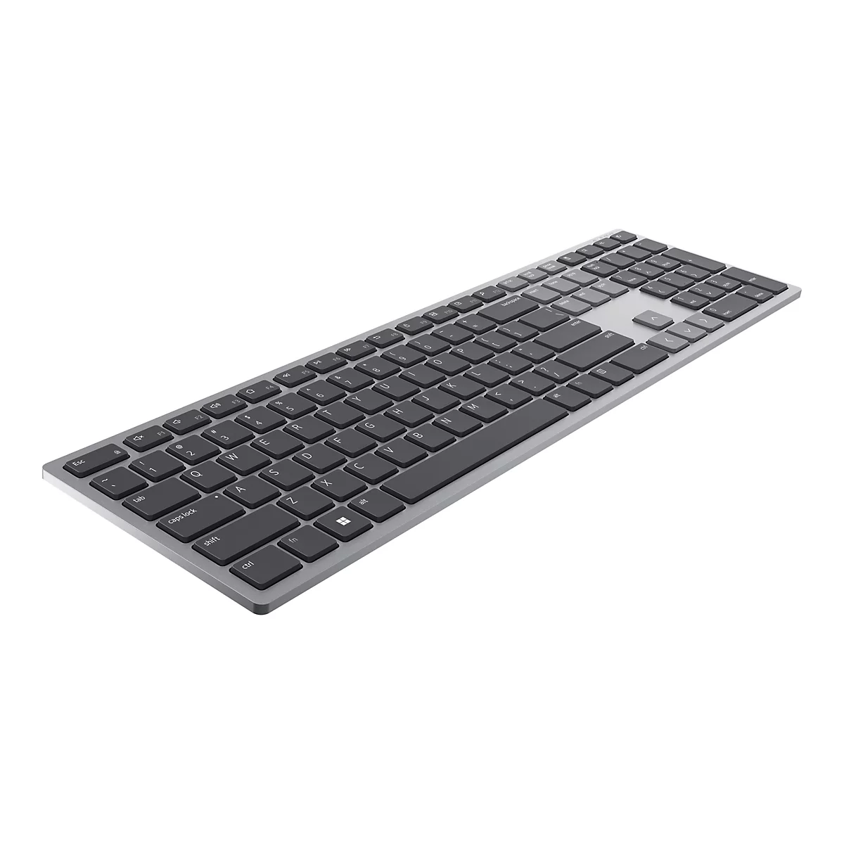 Un clavier argenté avec des touches noires sur fond blanc.