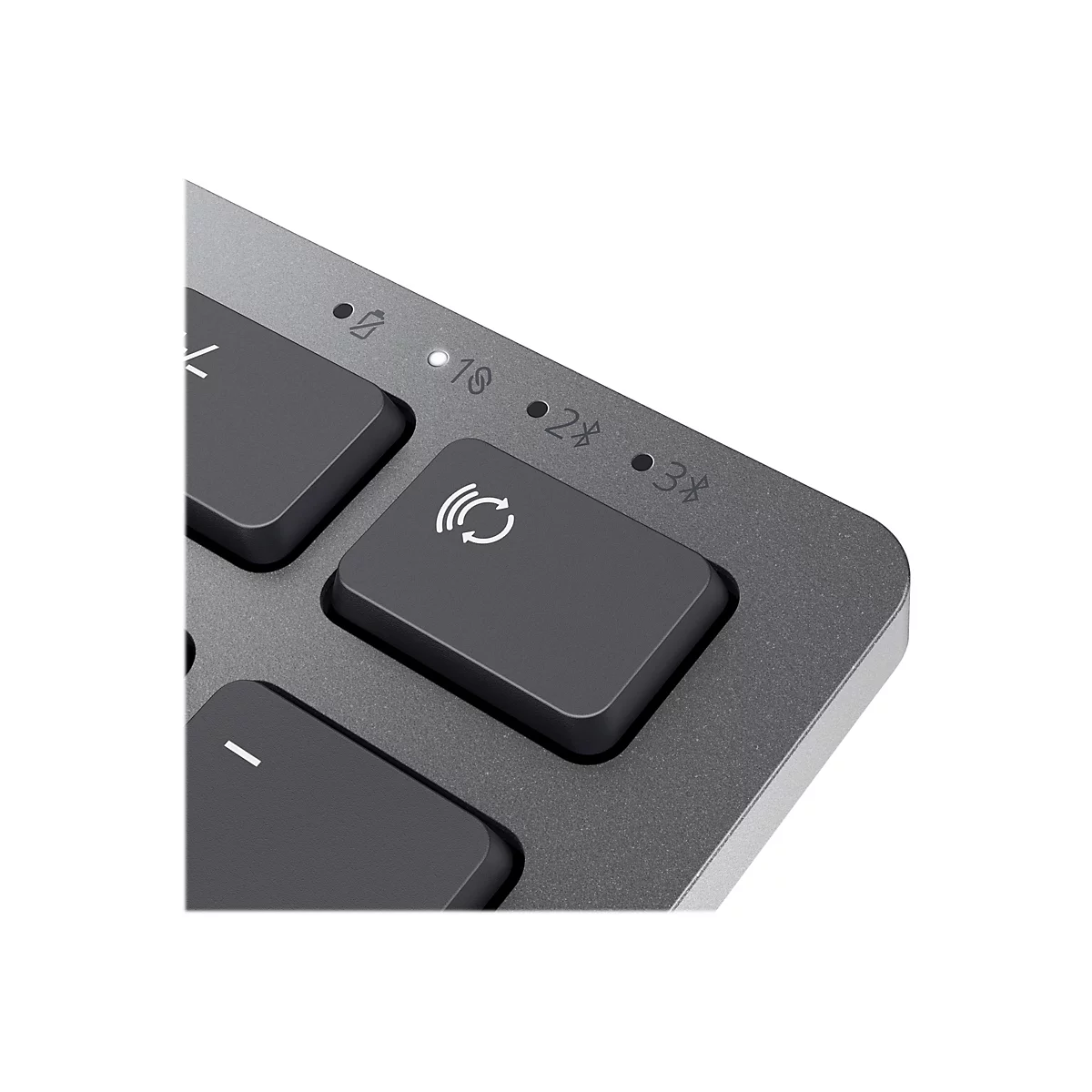 Gros plan sur un clavier d'ordinateur avec les touches 1, 2 et 3 pour les connexions et Bluetooth. Le gris et le noir dominent.