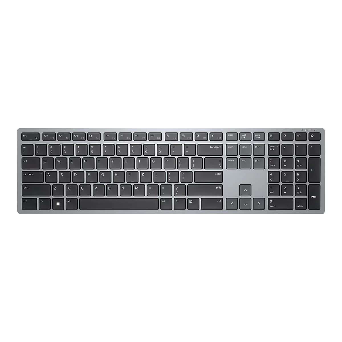 Vue de dessus d'un clavier argentÃ© avec des touches noires, isolÃ© sur fond blanc.
