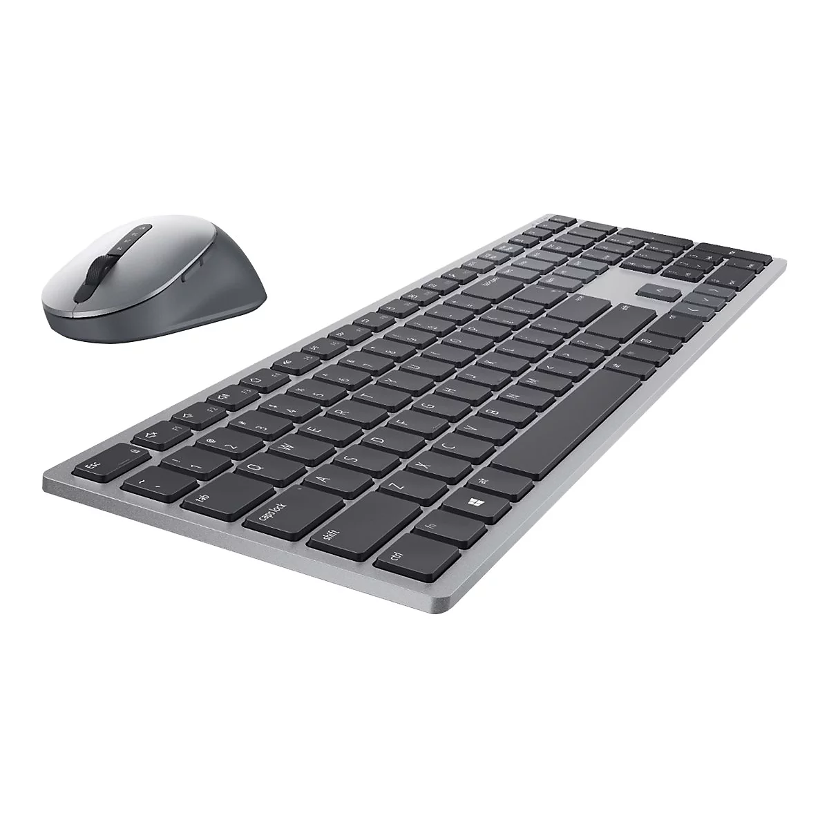 Graue Tastatur und Maus auf weißem Grund. Die Tastatur hat dunkle Tasten und einen silbernen Rahmen. Die Maus ist ebenfalls grau.