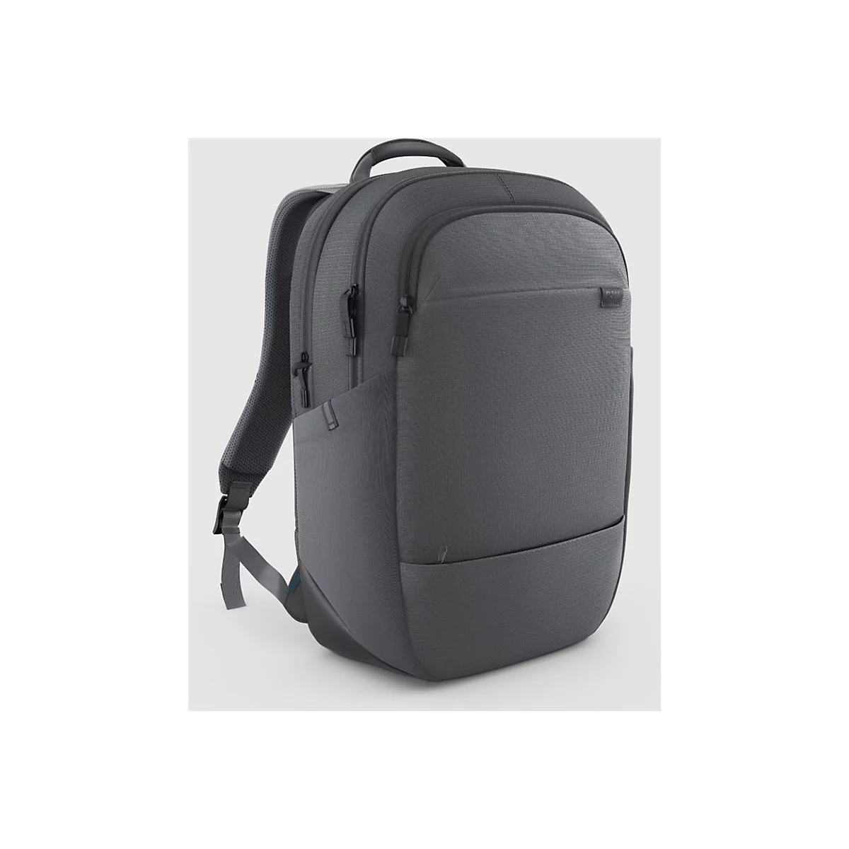 Sac à dos gris sur fond clair. Il a une surface texturée, des bretelles et une poignée.