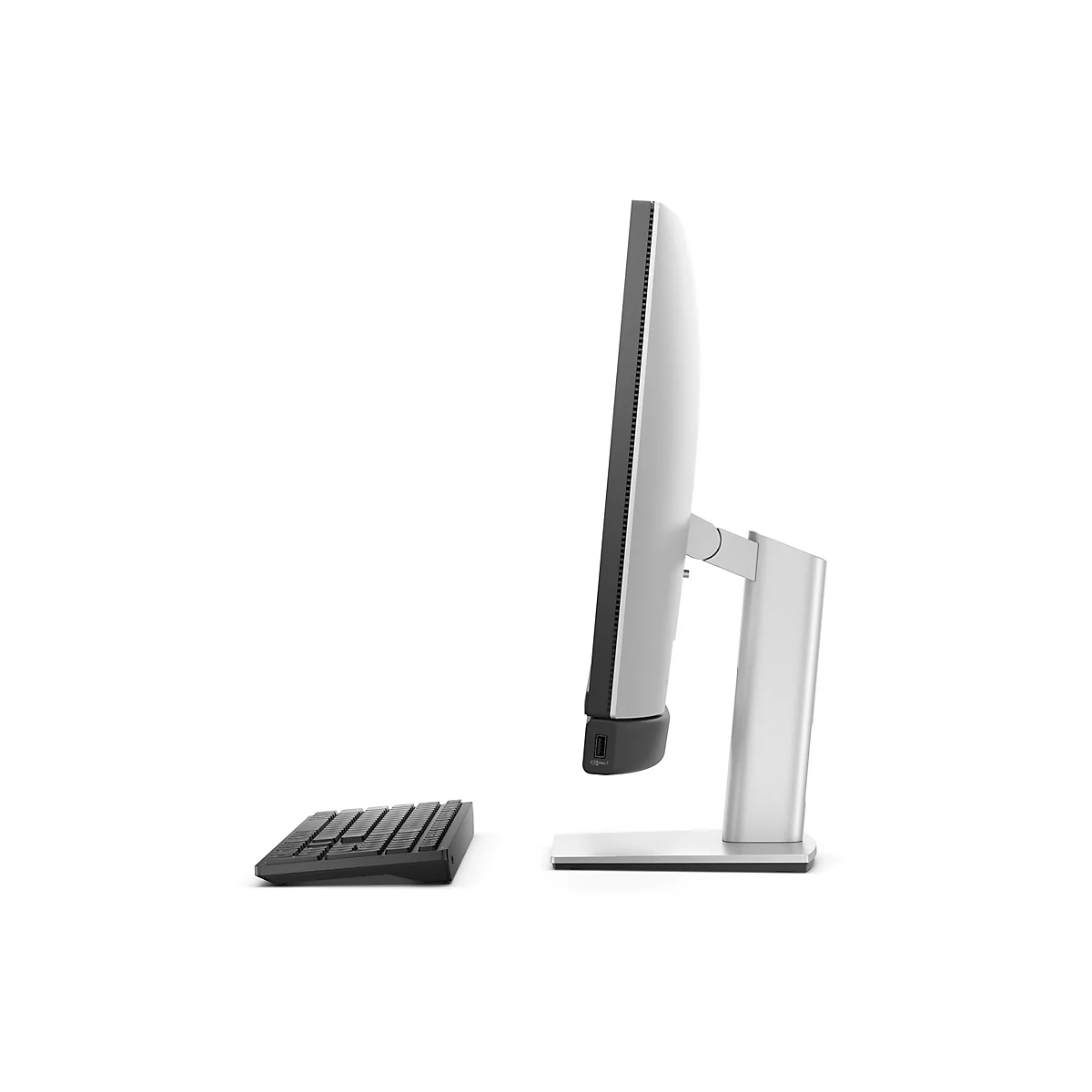 Ein Computerbildschirm im Profil mit angeschlossener Tastatur vor weißem Hintergrund.