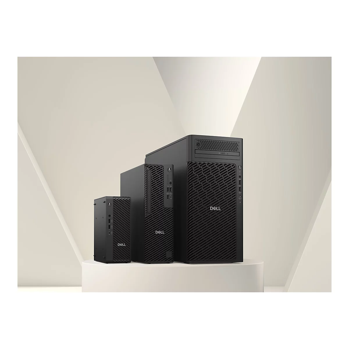 Drei schwarze Dell Computer auf einer weißen Säule. Der größte hat ein strukturiertes Gittermuster. Logo Dell sichtbar.