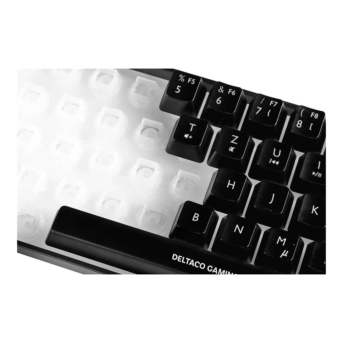 Nahaufnahme einer Tastatur, links ohne Tastenkappen, rechts mit schwarzen Tasten mit weißer Beschriftung.