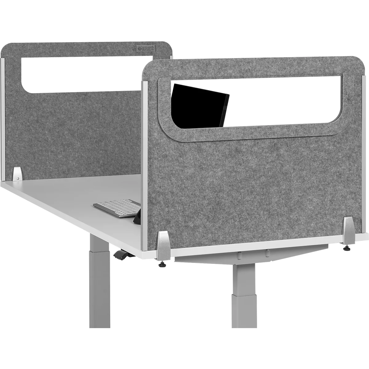Grey desk partition with monitor cutout, keyboard, white desk, height adjustable.