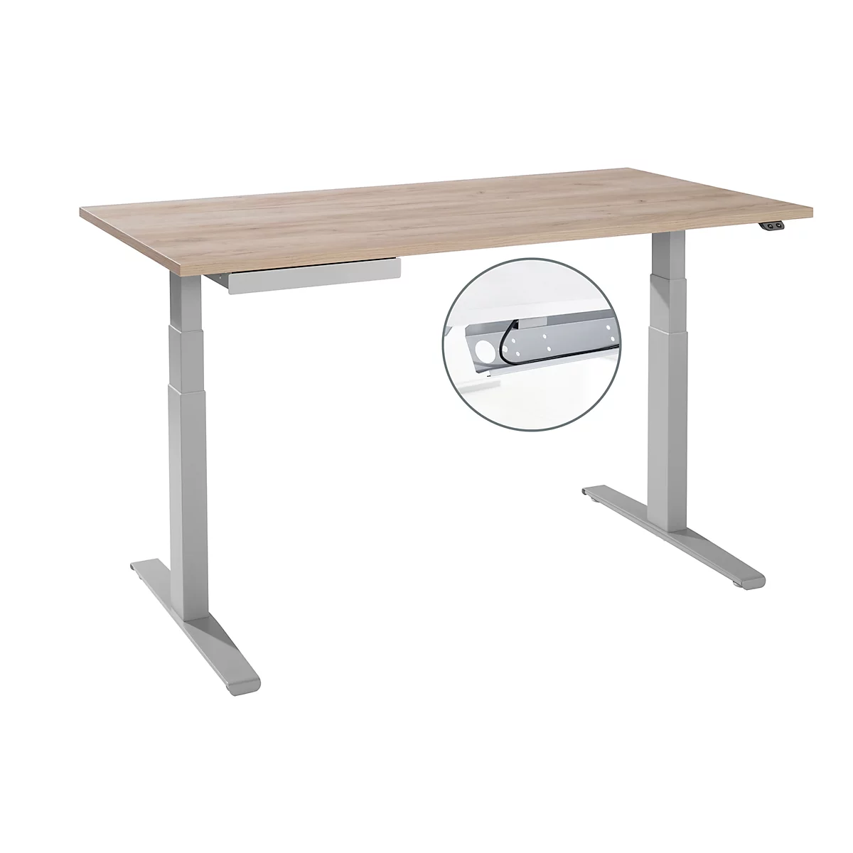 Height-adjustable light brown desk on a white background. Detailed view of the cable routing.