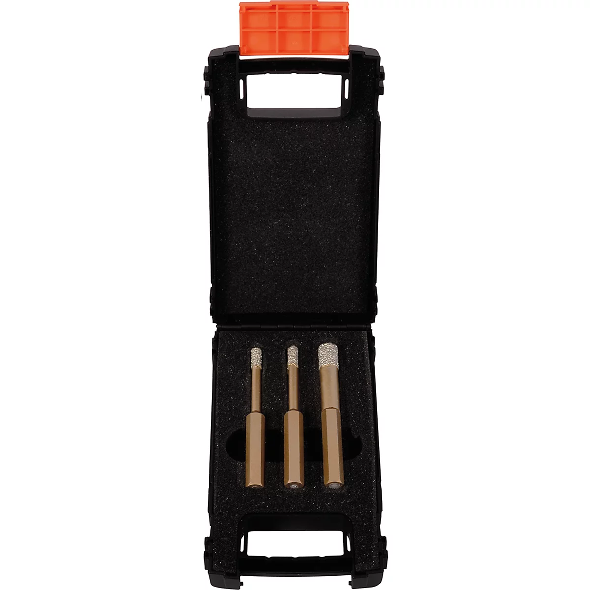 Case with three diamond-coated drill bits. Black case, orange holder.