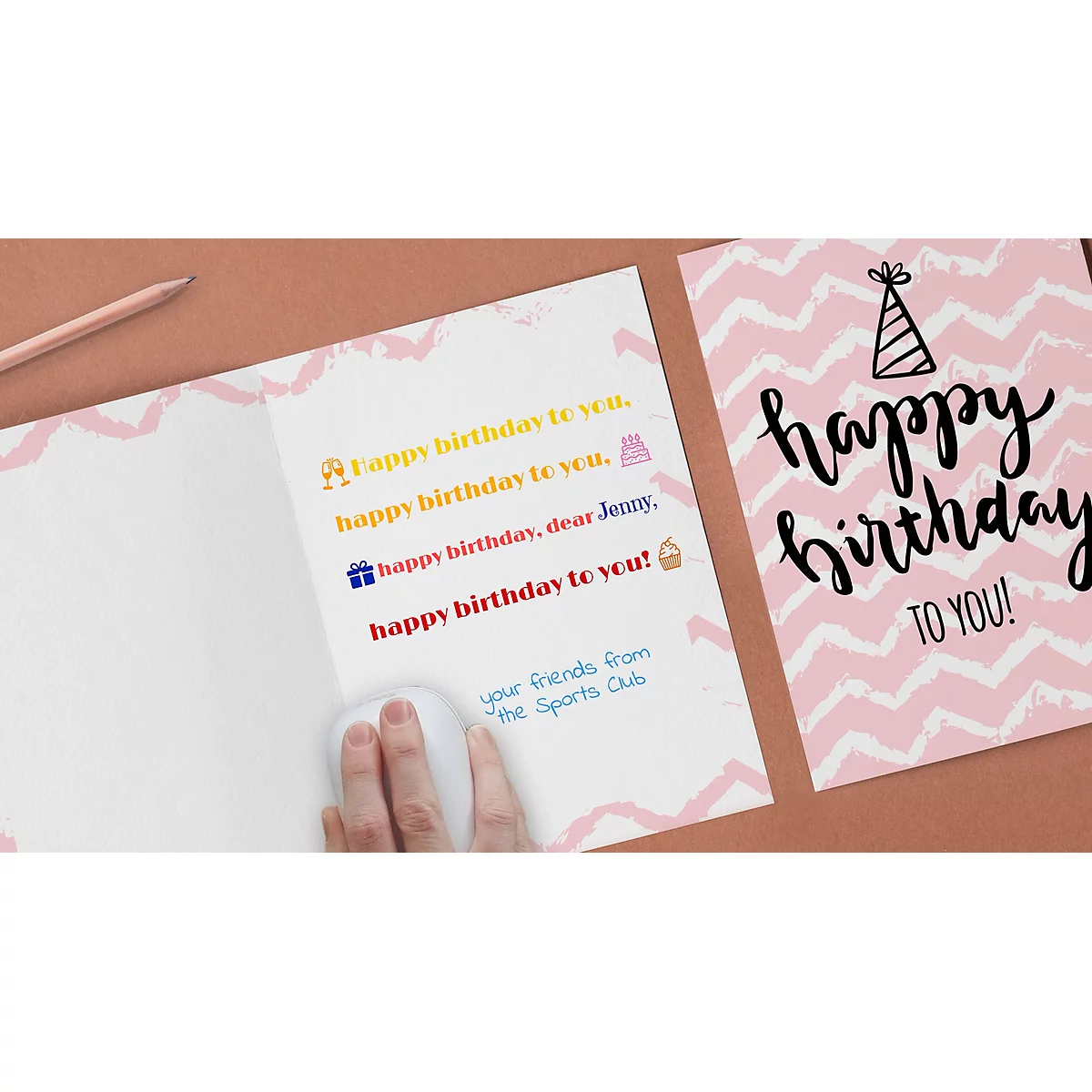 Open birthday card, pink and white. Inside: text for Jenny. Hand with computer mouse.