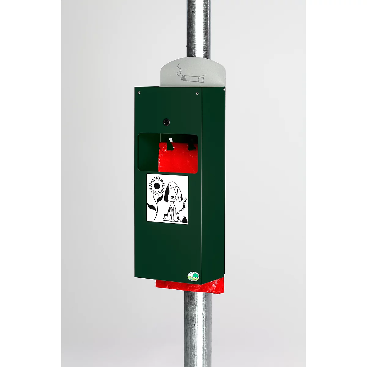 Groene hondenpoepzakdispenser met een sticker van een hond en zonnebloem, bevestigd aan een metalen paal. Een asbak bovenop.