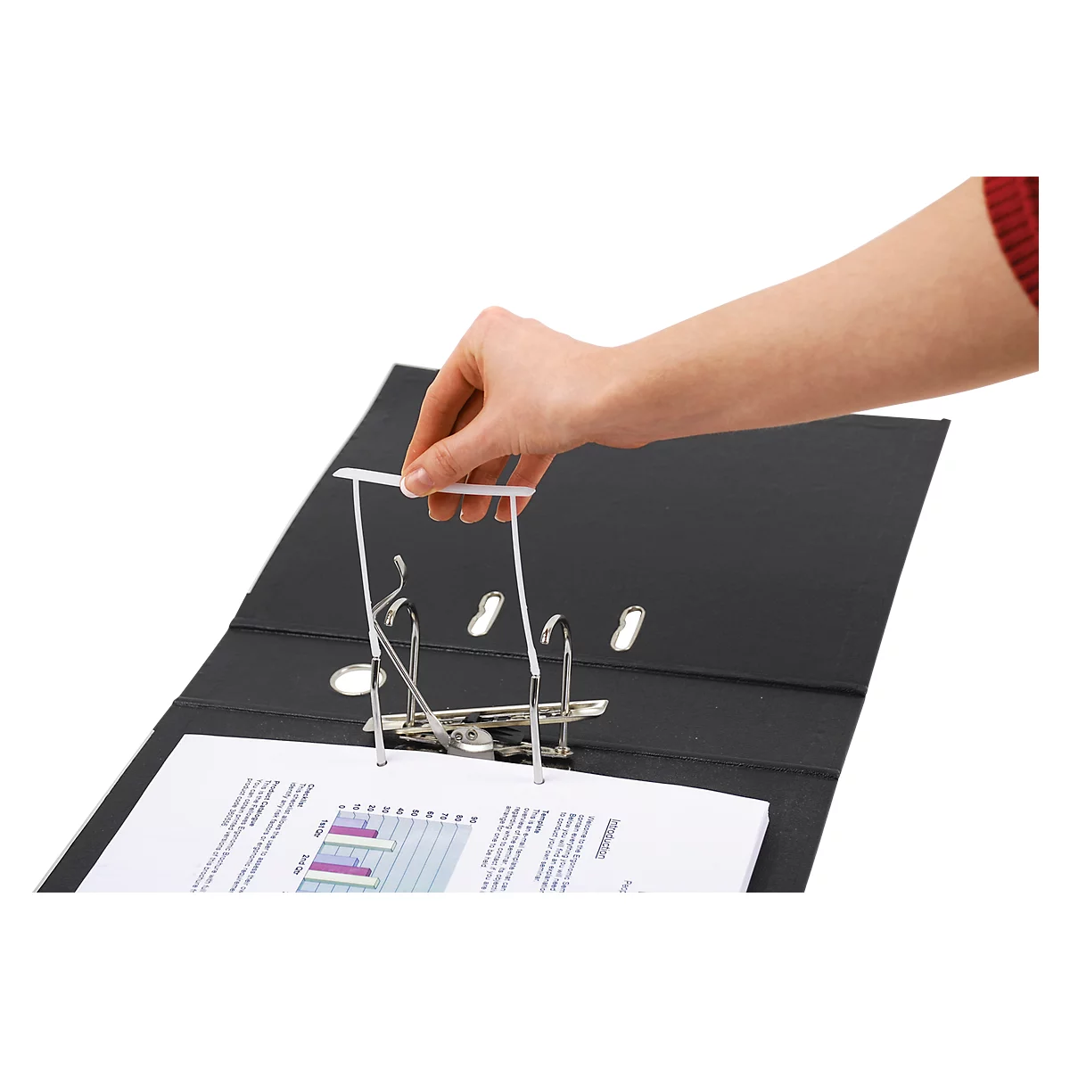 A hand opens a black binder. The locking mechanism is being operated.