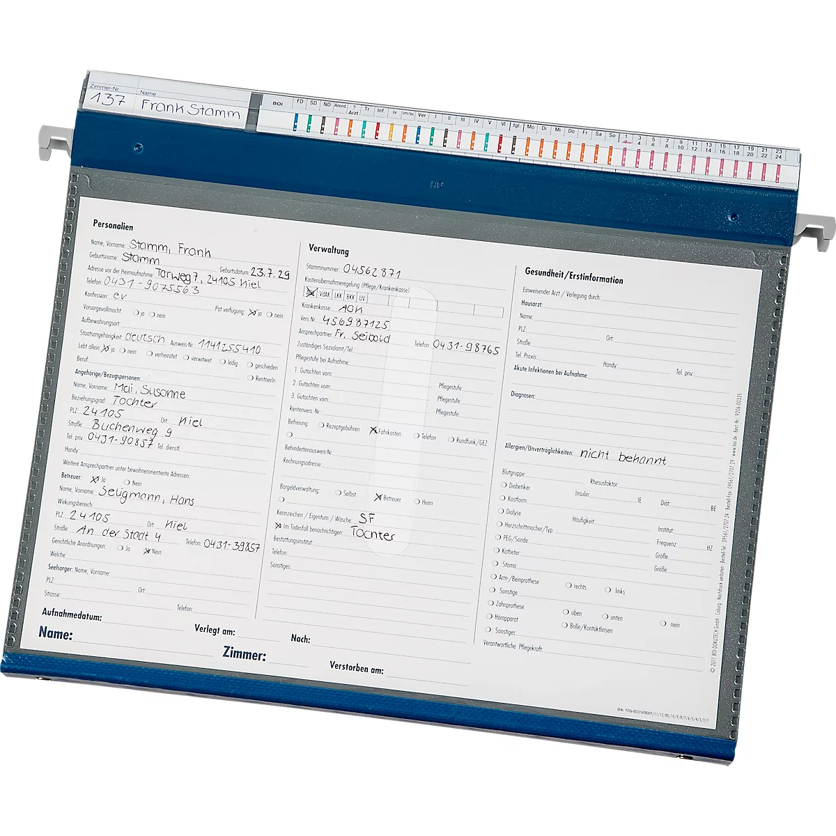 Classeur suspendu bleu-gris avec des notes étiquetées et des marquages colorés.