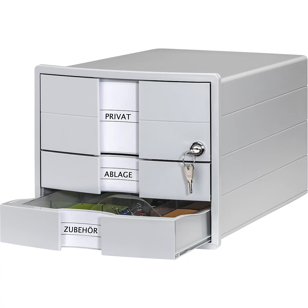 Gray drawer box with three drawers. Labeled: PRIVATE, STORAGE, ACCESSORIES. One drawer is open.