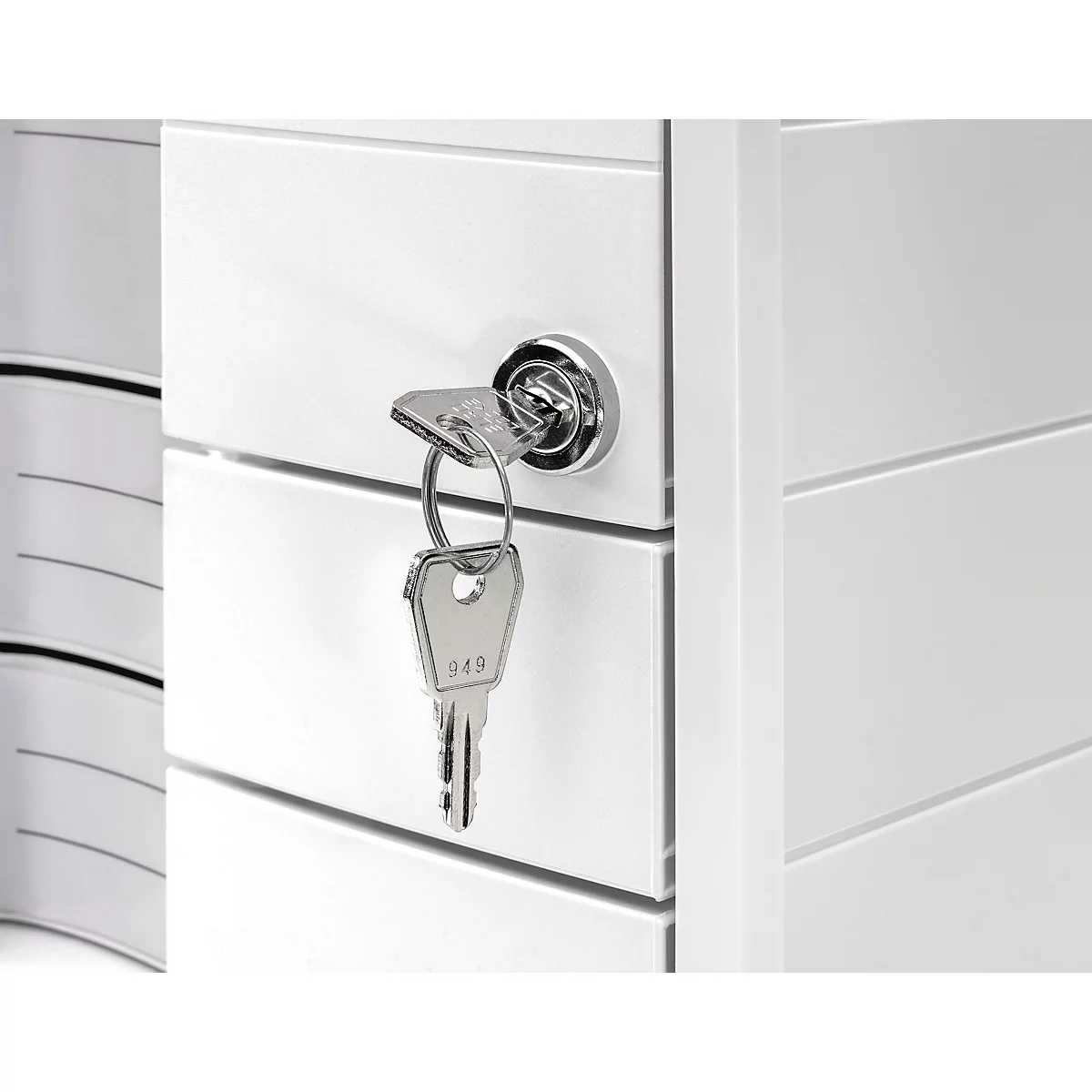 Keyhole with key; silver. The key is in the lock.