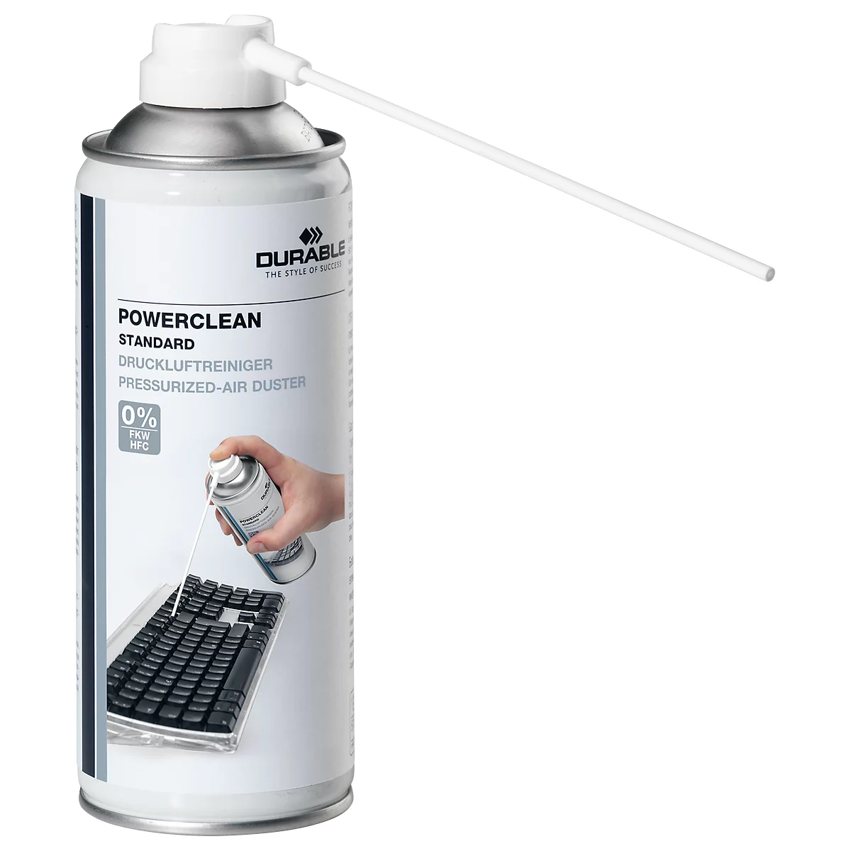 Pressurized air duster cleaning a keyboard. Powerclean can, nozzle aimed at keys. Hand holding can.