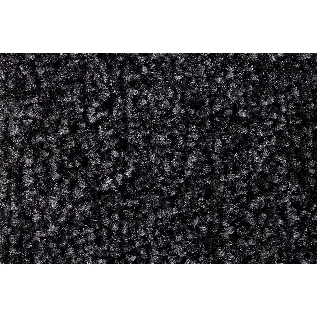 Primer plano de una superficie de alfombra gris texturizada con pelo denso.