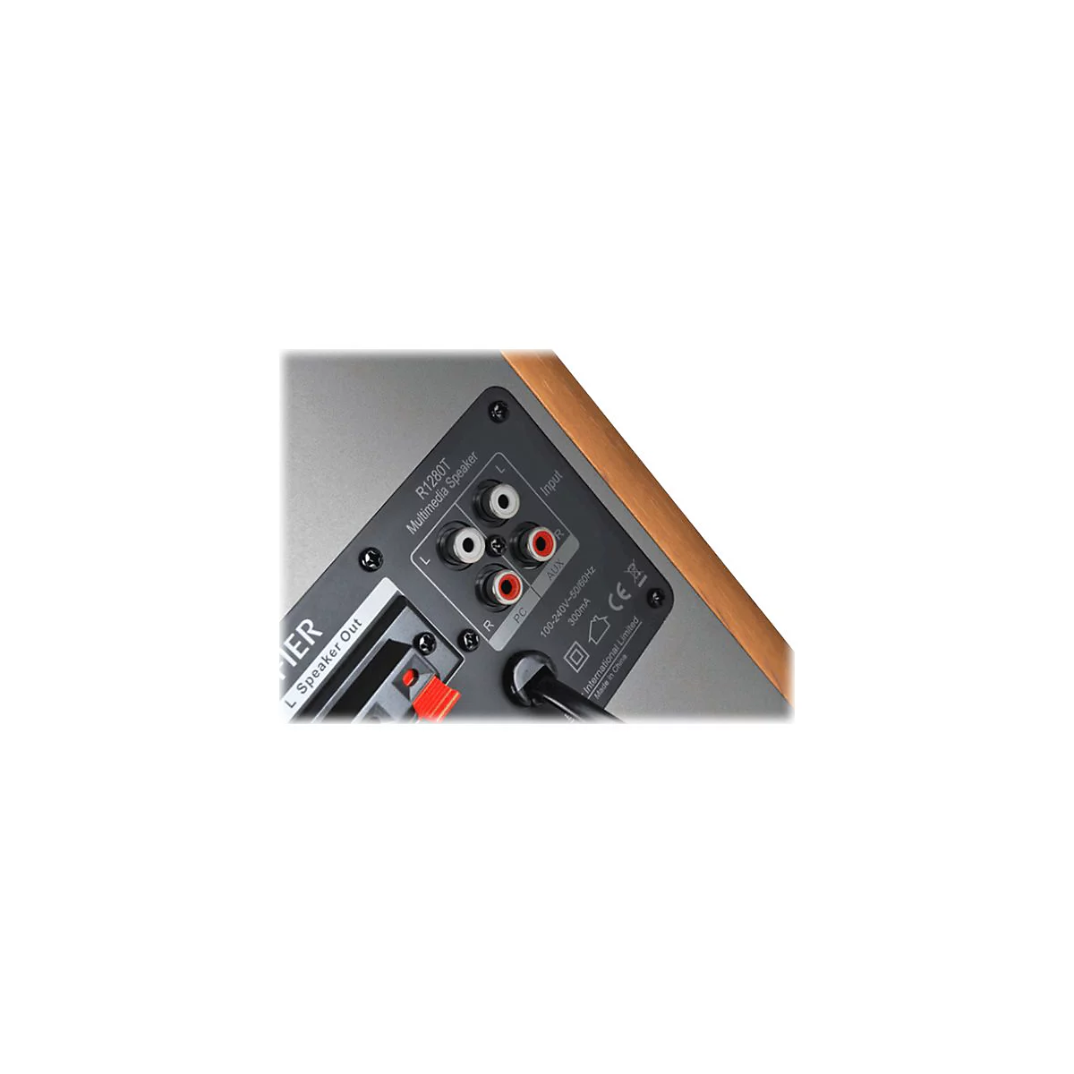 Rückseite eines R1280T Lautsprechers mit zwei Cinch-Eingängen für PC und AUX.