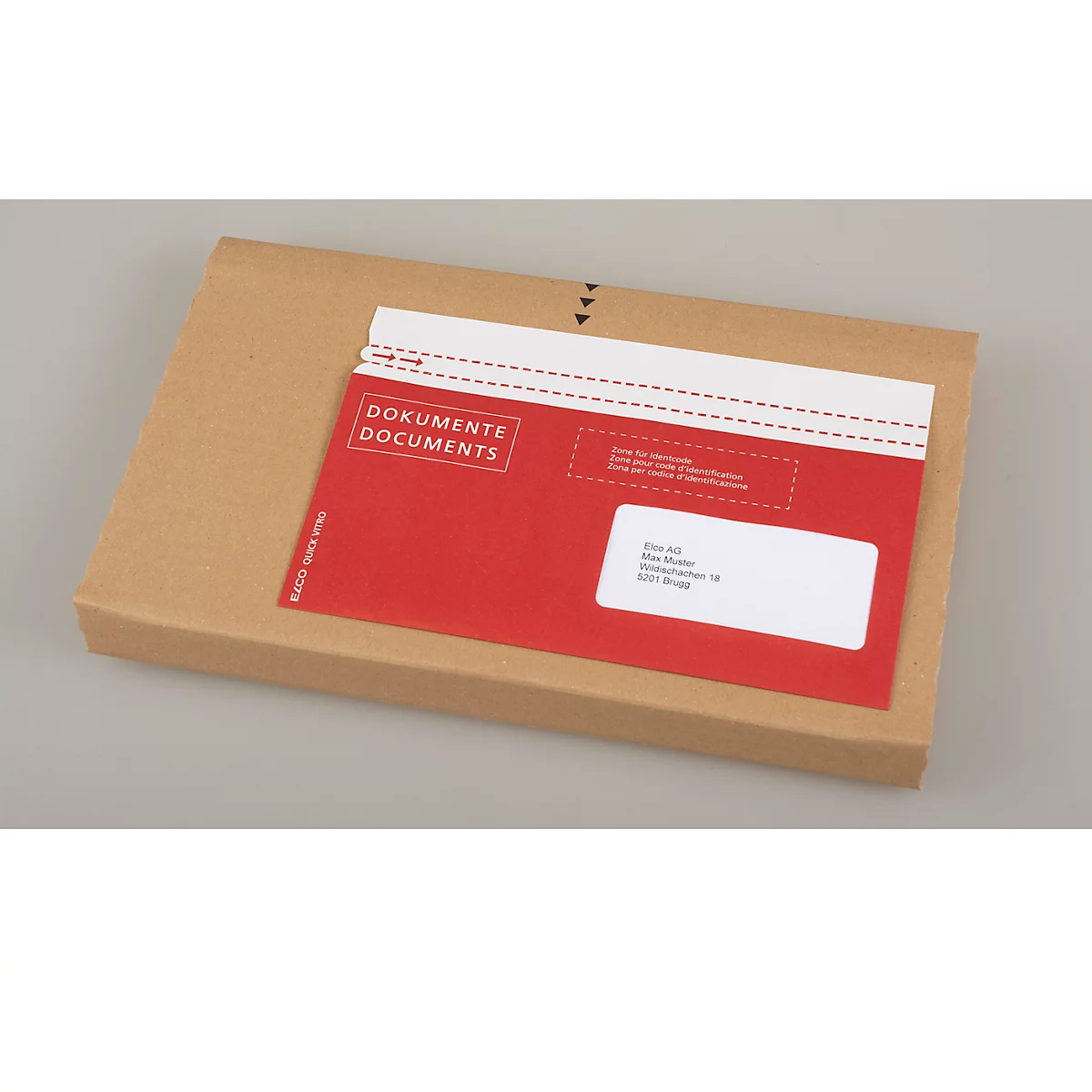 Red document in a brown cardboard box, with white address field, inscription 'Documents'.