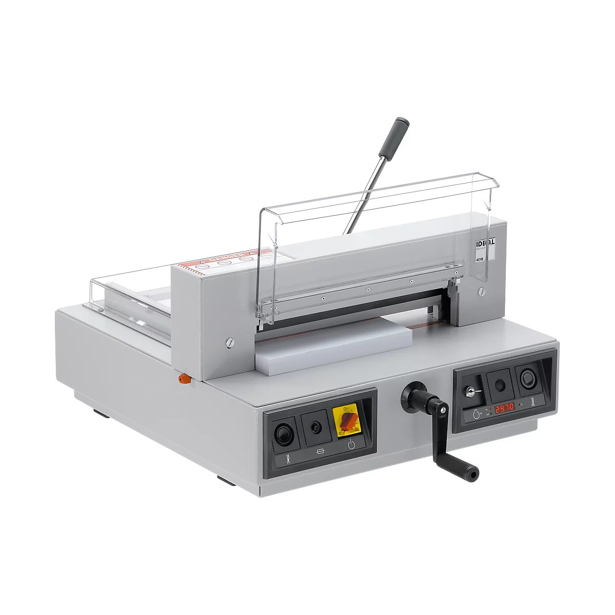 Gray paper cutter with operating lever and protective device. The device is on a table.