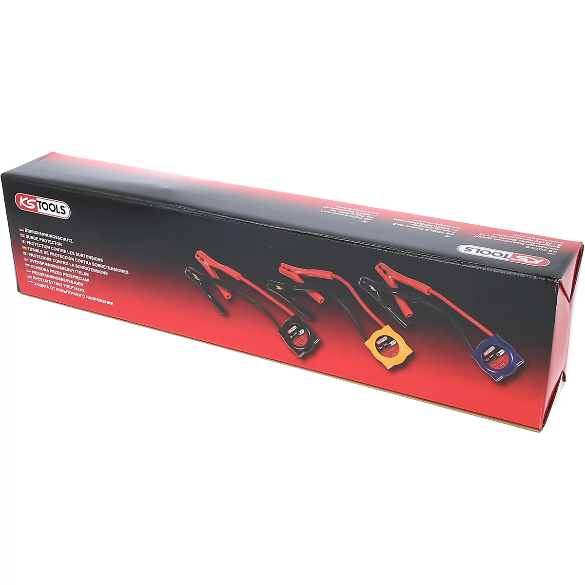 Dunkelrote Box mit Werkzeugen. In der Box sind drei Batterieklemmen in den Farben Schwarz, Gelb und Blau abgebildet.