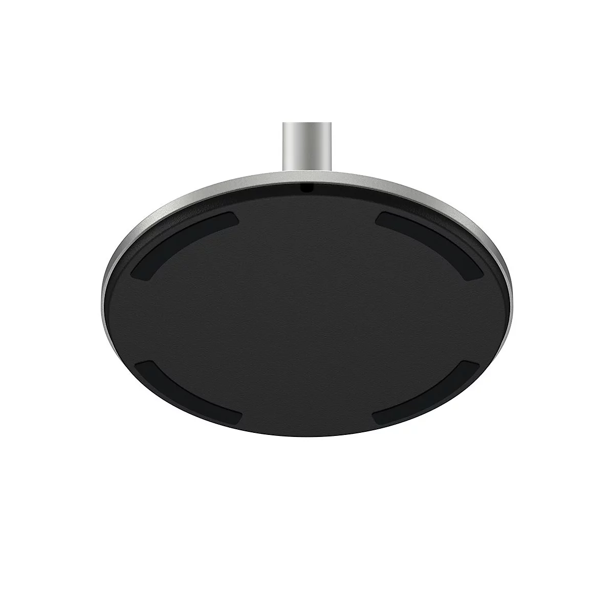 Nahaufnahme der Unterseite eines Monitorständers. Runde Basis, silberfarben mit schwarzer, strukturierter Auflage und schwarzen Gummifüßen.